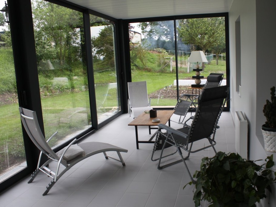 Véranda espace détente.