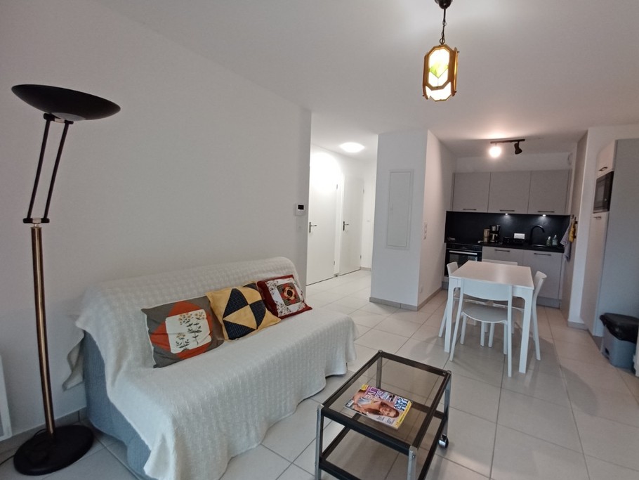 Espace de vie avec canapé convertible