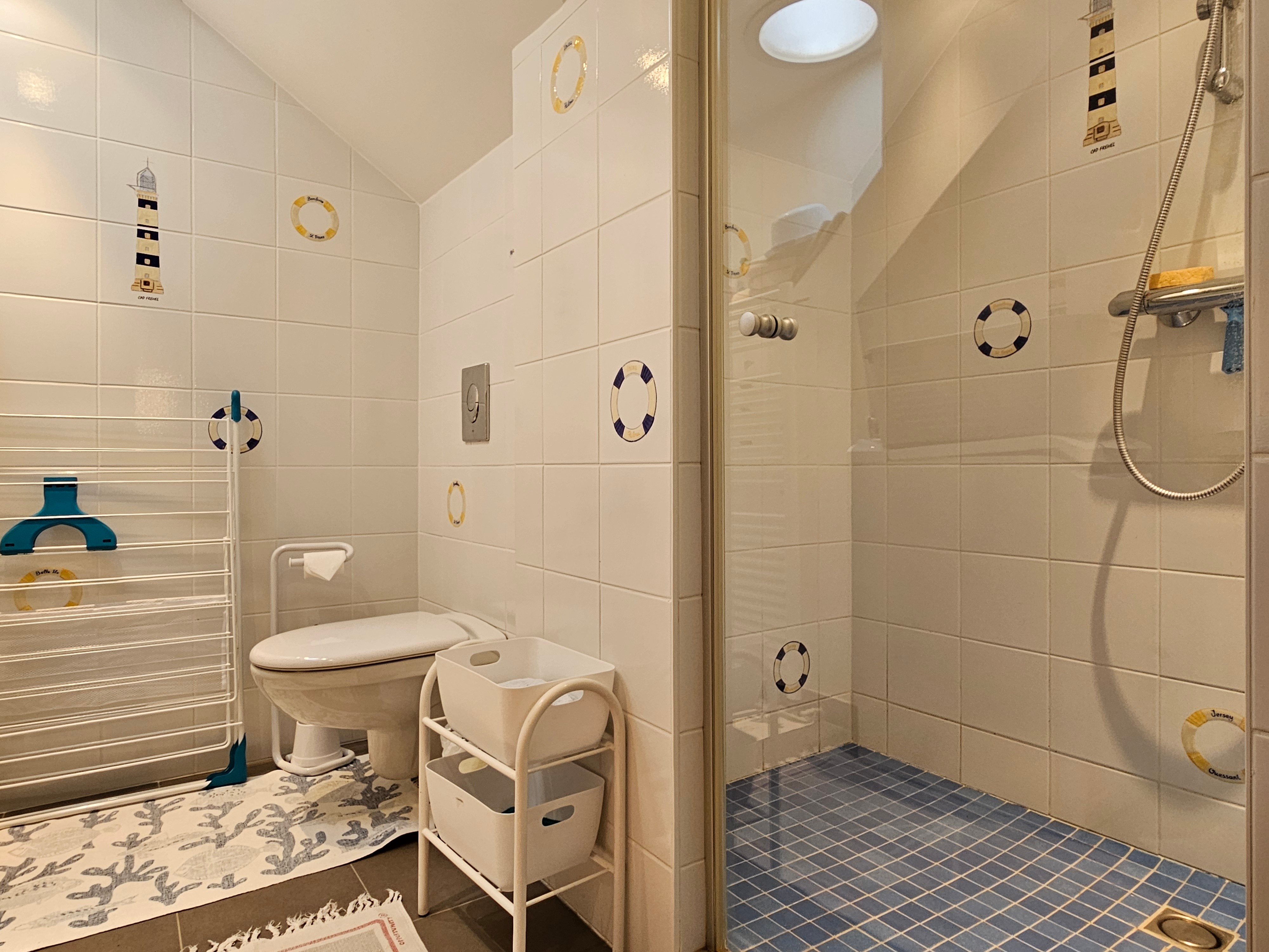 Private shower room and WC.
