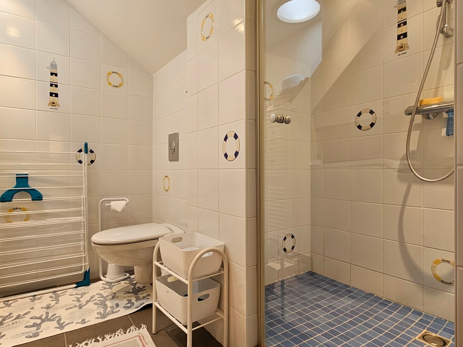 Private shower room and WC.