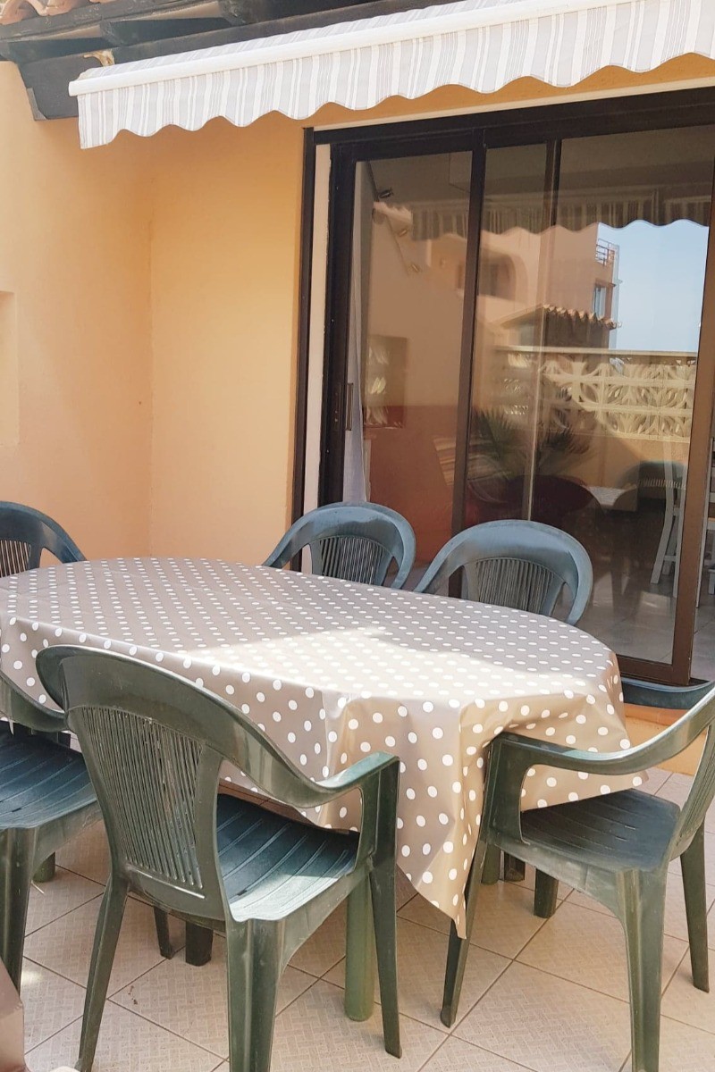 Terrasse avec store banne