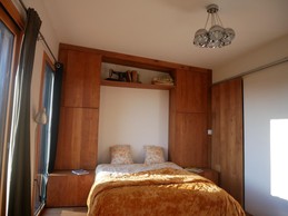 Le lit escamotable en chêne massif