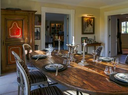 Open-plan dining room with golf view