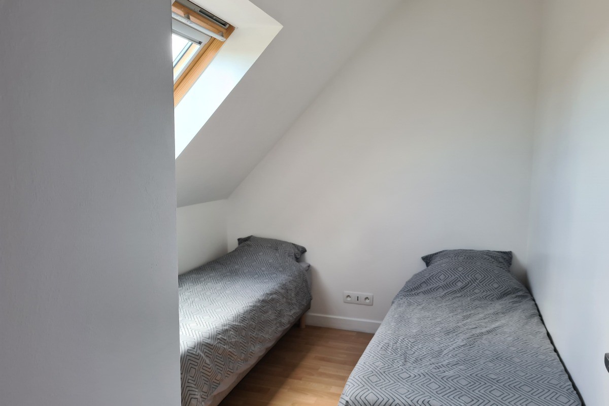 Une deuxième chambre avec 2 lits de 80