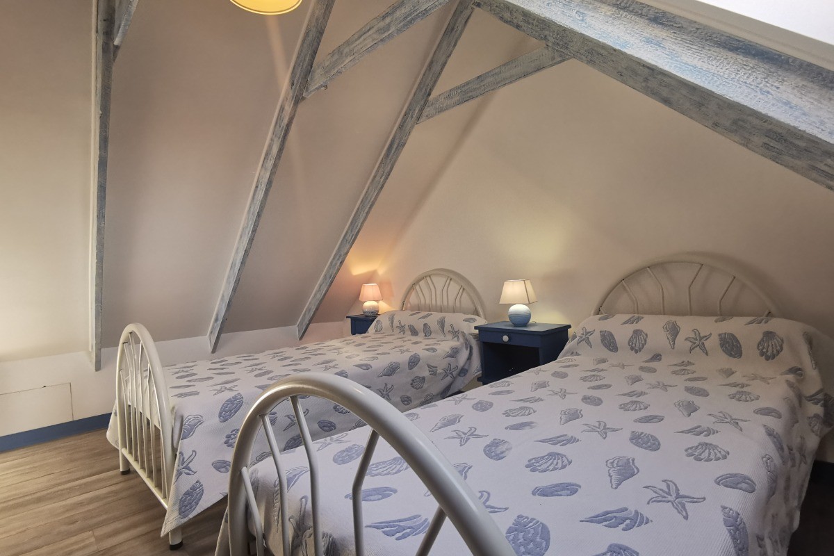 Chambre avec 2 lits 90