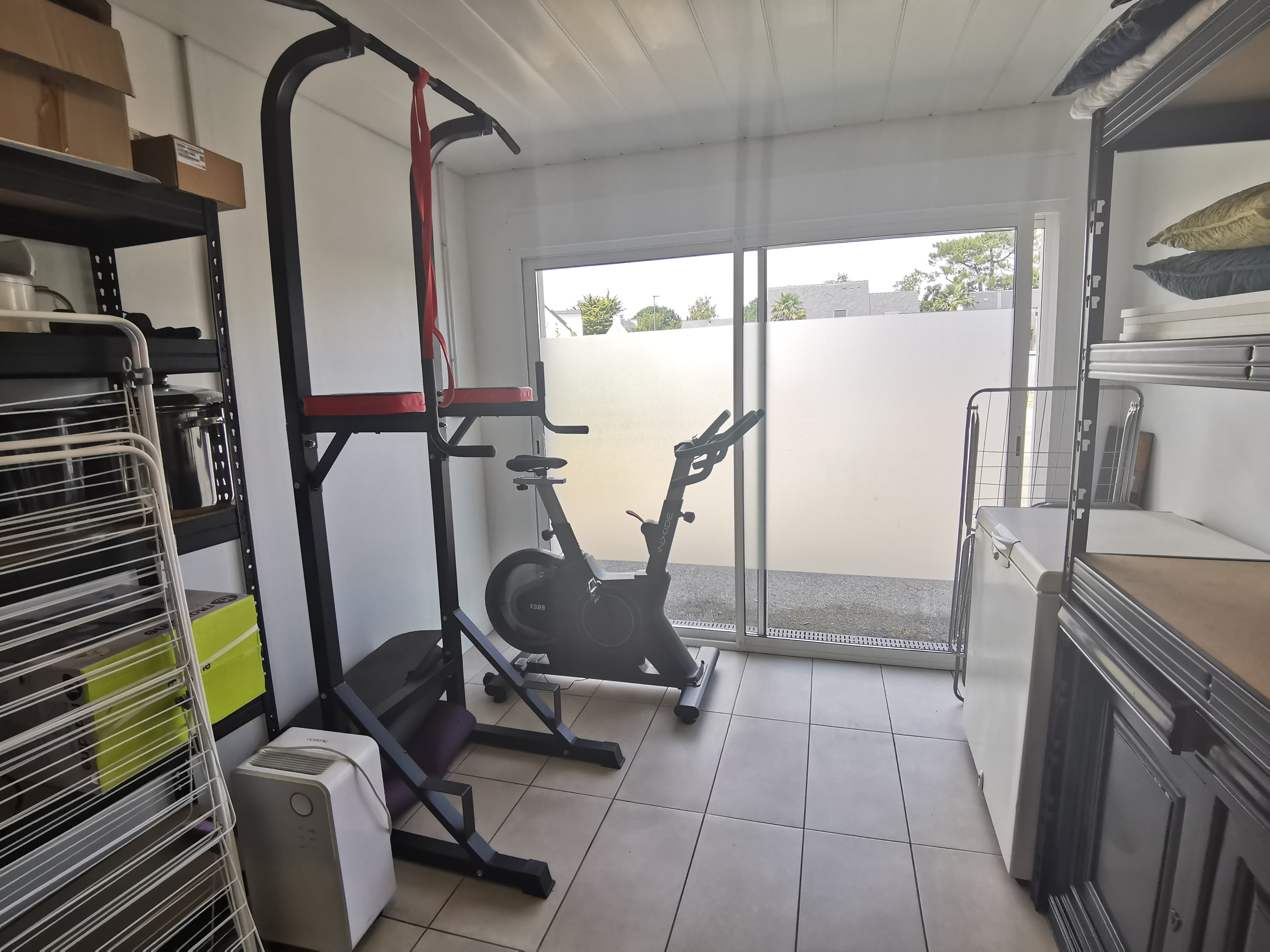 Exercise bike and pull-up bar