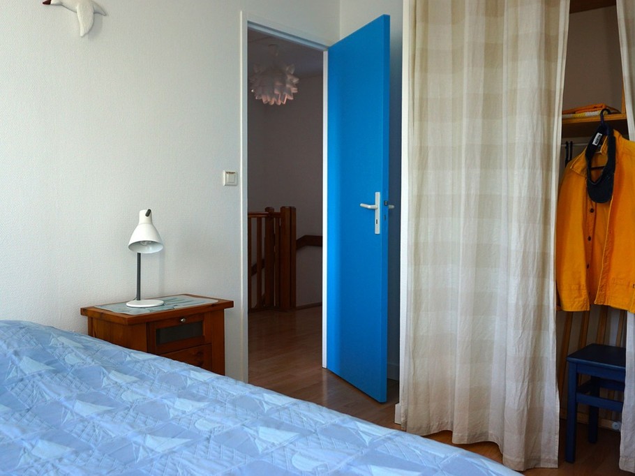 A bedroom with storage