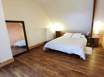 Un lit de 160x200 dans ce magnifique espace