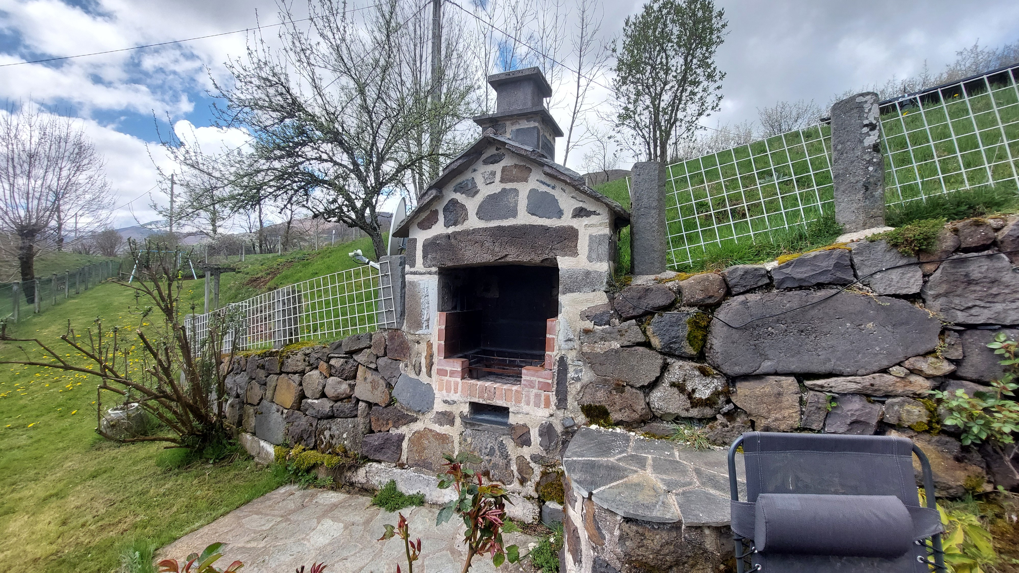 stone barbecue outside Cantal gîte