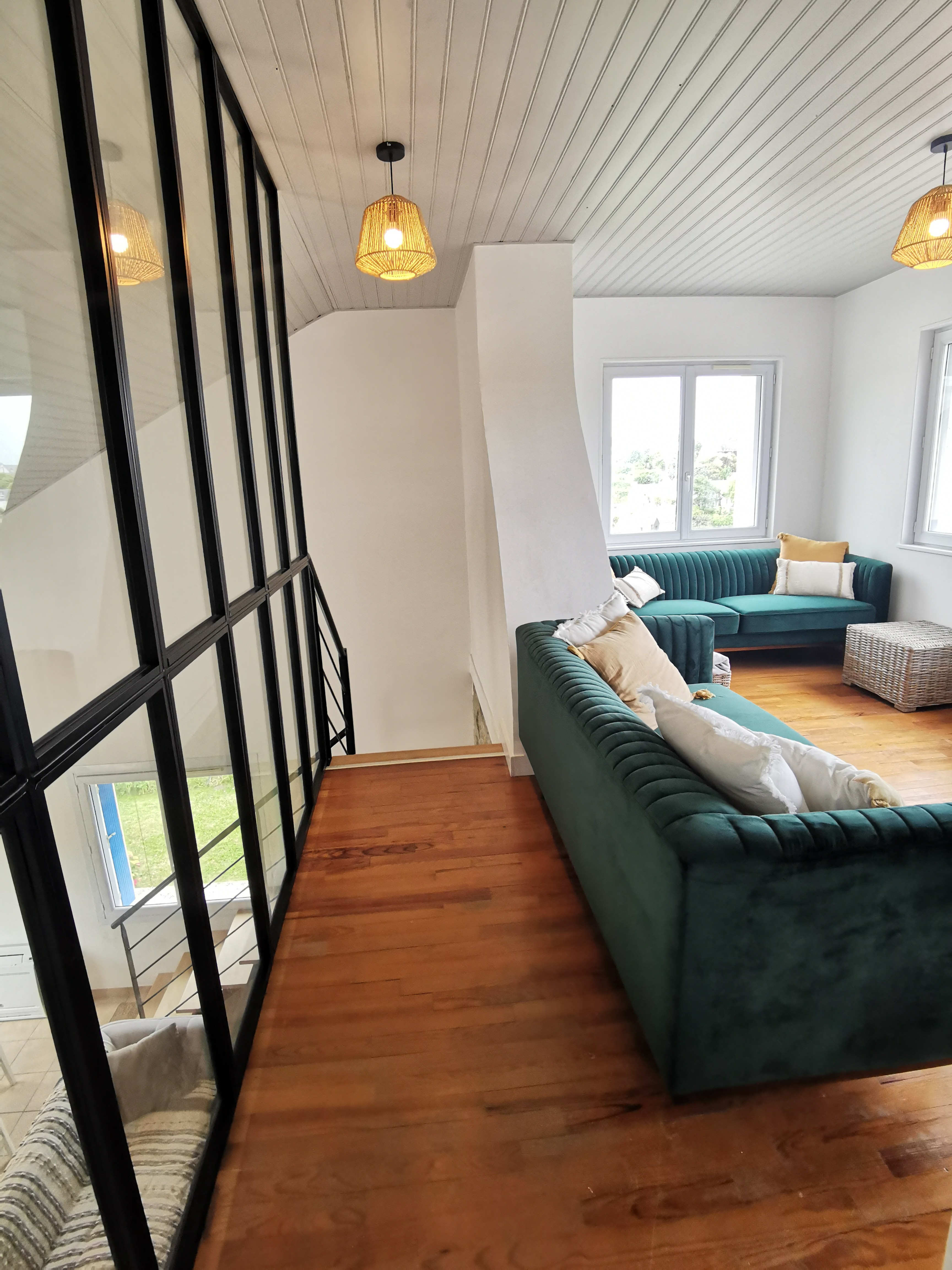 Living room with TV upstairs