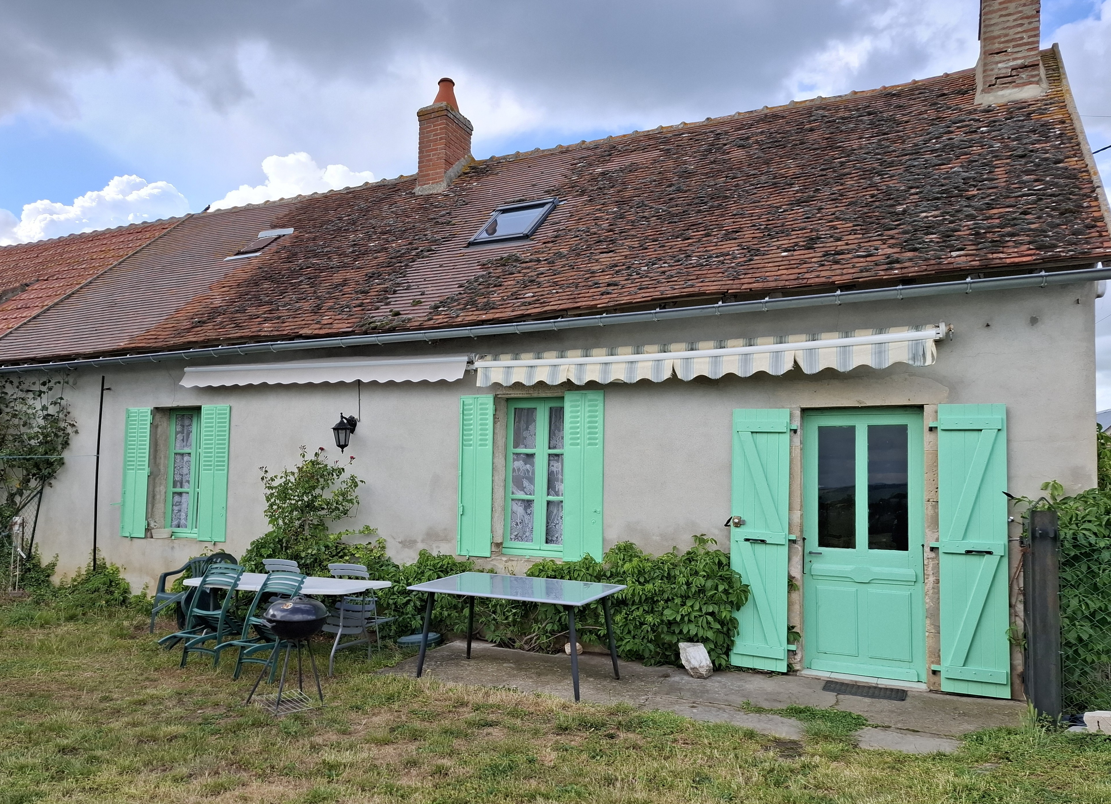Terrasse avec 2 stores bannes