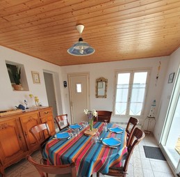séjour dans véranda donnant sur terrasse