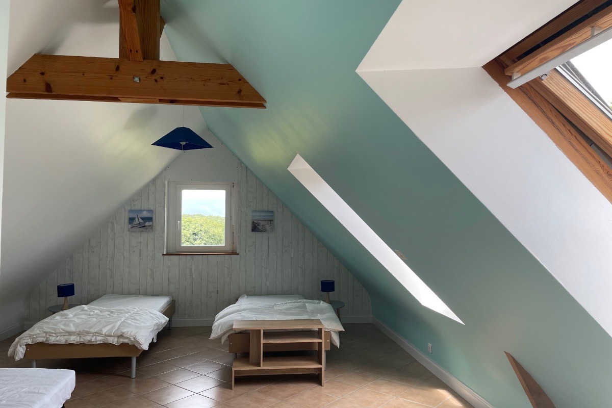 Chambre 4 avec 3 lits simples