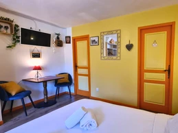 view of the bedroom and small sitting room