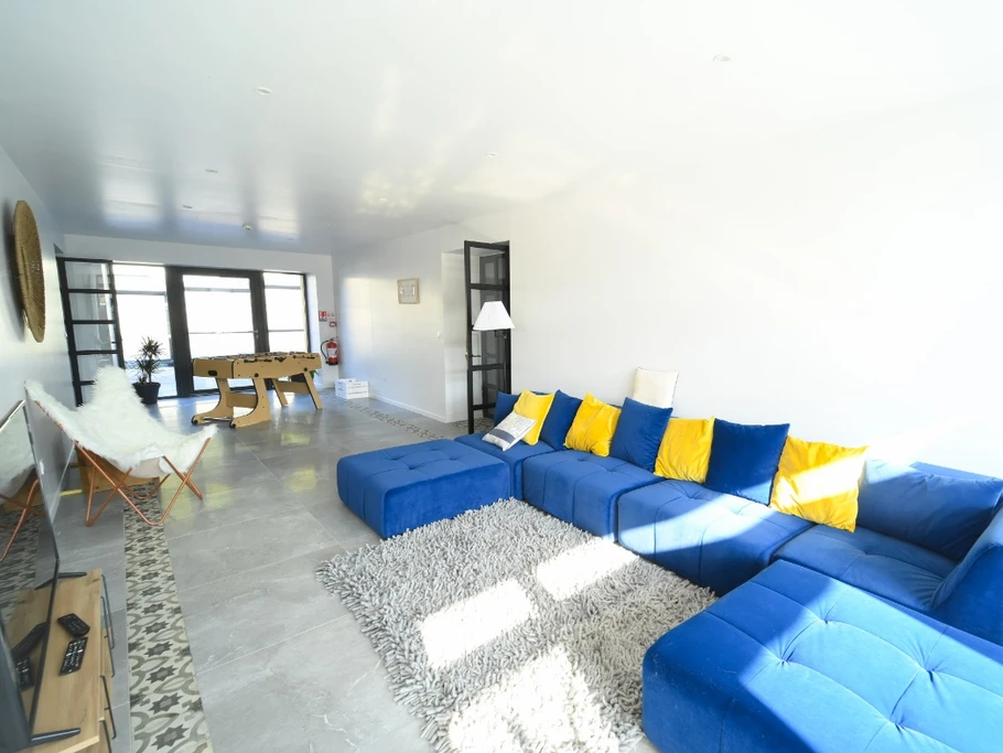 La salle de jeu et son coin détente