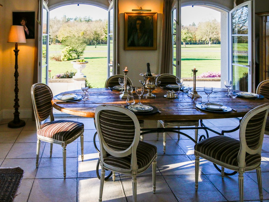 Open-plan dining room with golf view