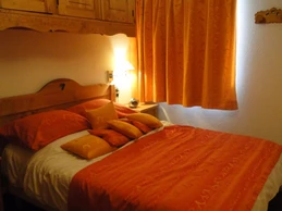 Location appartement Les Menuires- chambre au RDC