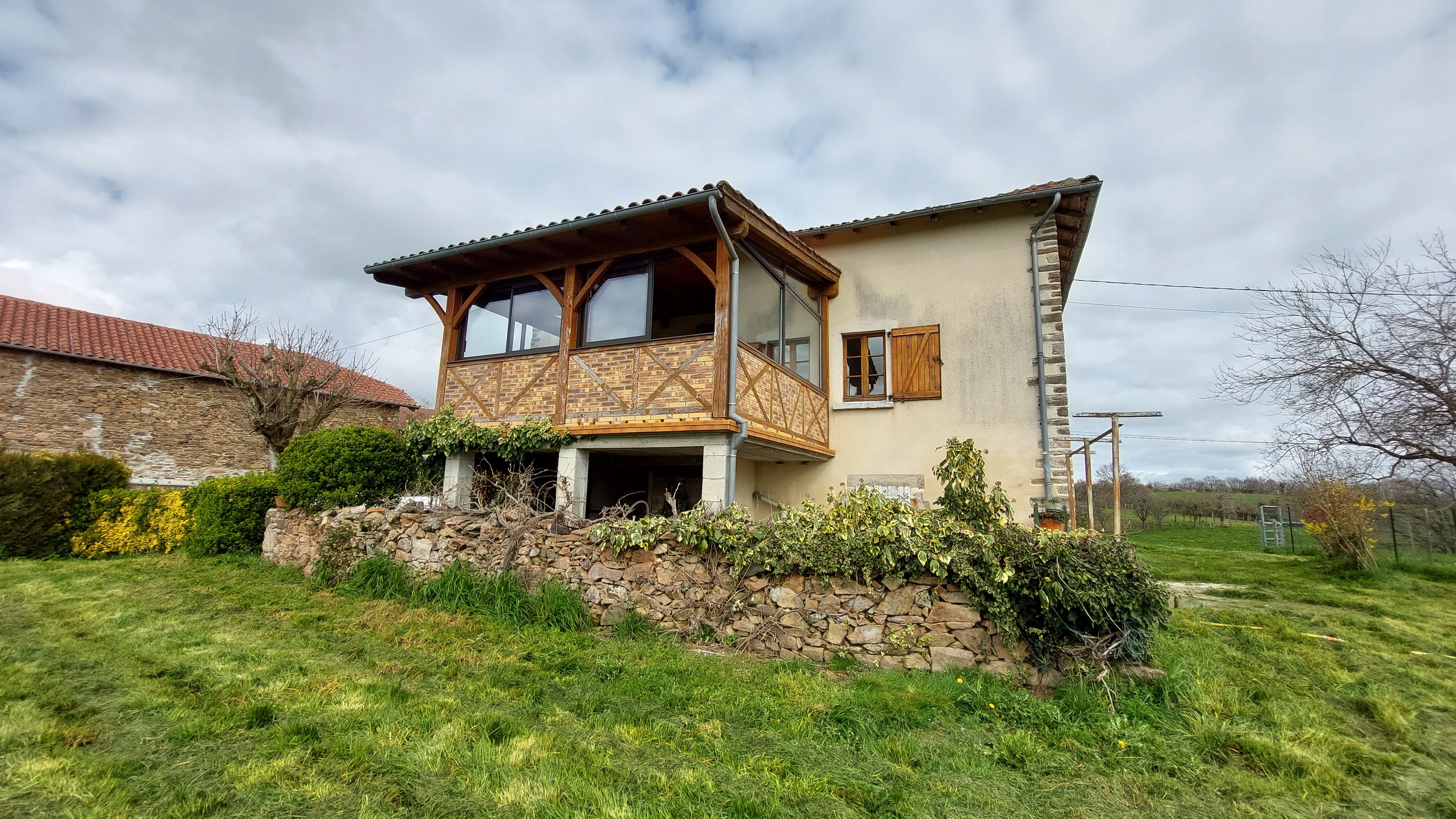Outside the gîte with garden and peaceful natural surroundings