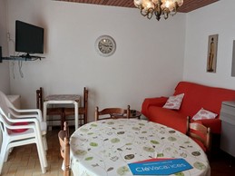 Kitchen opening onto living room