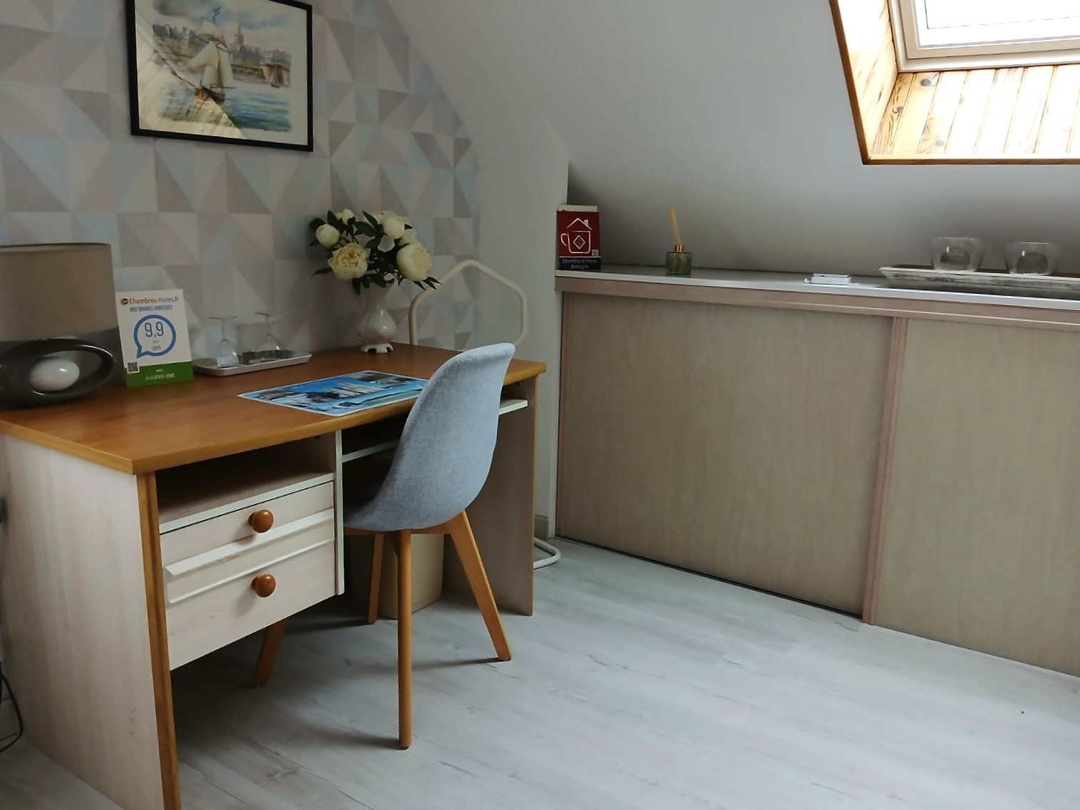 Bedroom 1 - 140 x 190 cm bed with desk, kettle and tea set, TV, wardrobe and chest of drawers.