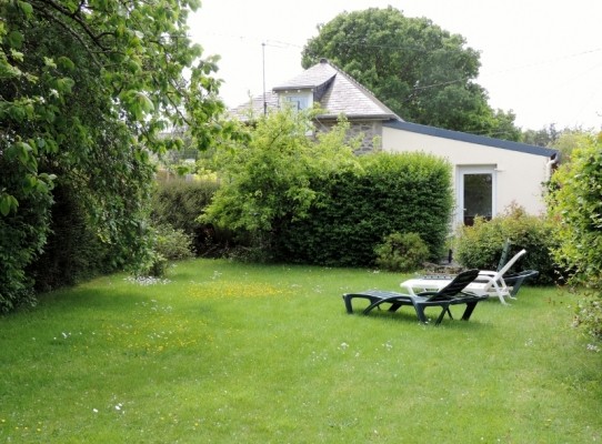 Via location de vacances , Clévacances Extérieur coté jardin