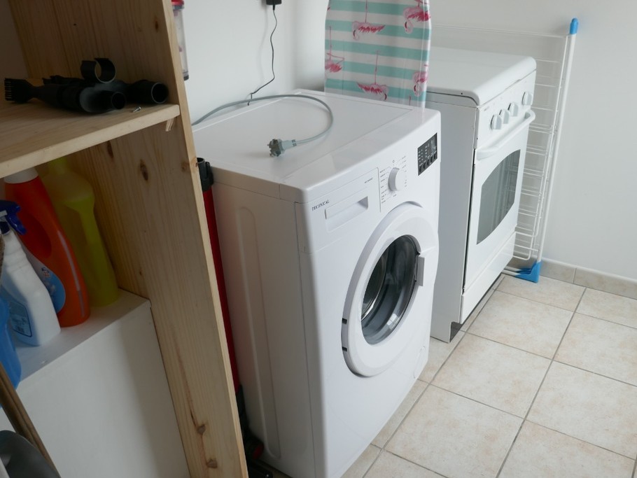 arrière cuisine donnant sur le patio