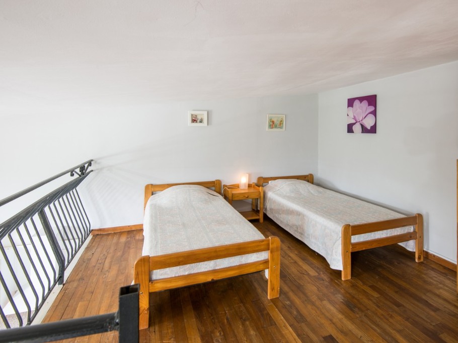 Lits jumeaux chambre en mezzanine