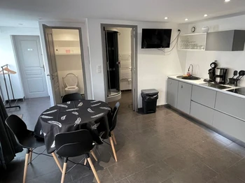 VIEW OF BATHROOM AND SEPARATE TOILET