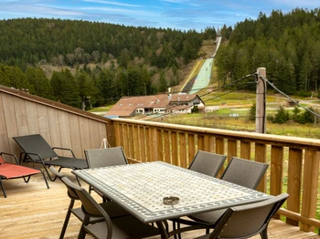 Terrace overlooking the Nordic ski area and its ski jump - La Ruelle - Les Spatules