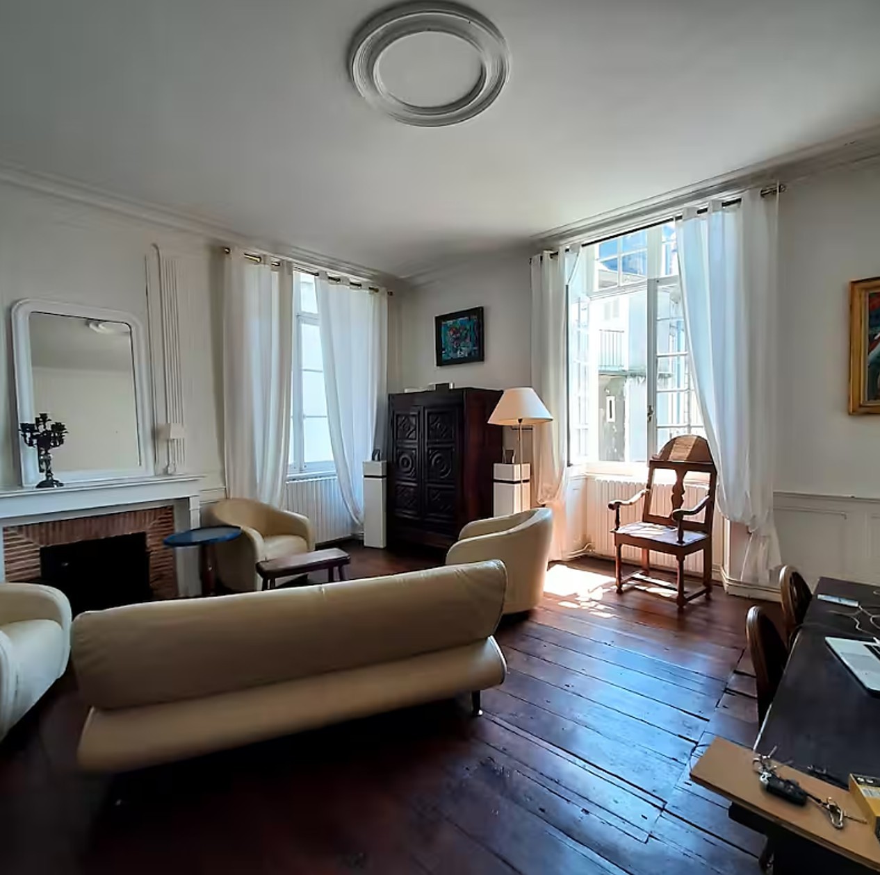 Living room with high ceilings and fireplace