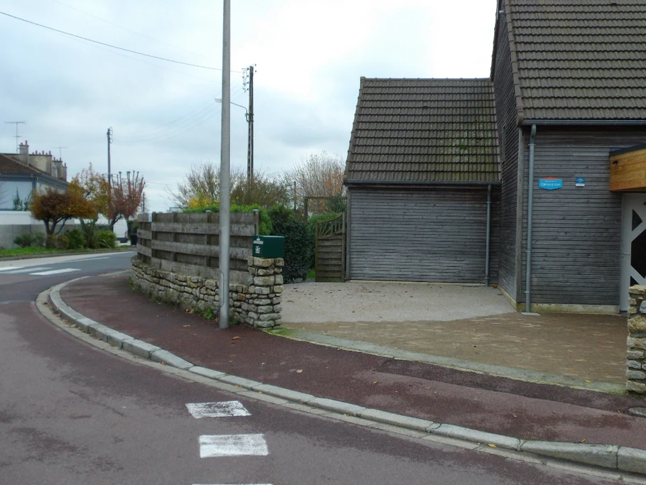 Outside north: parking space and access to garden