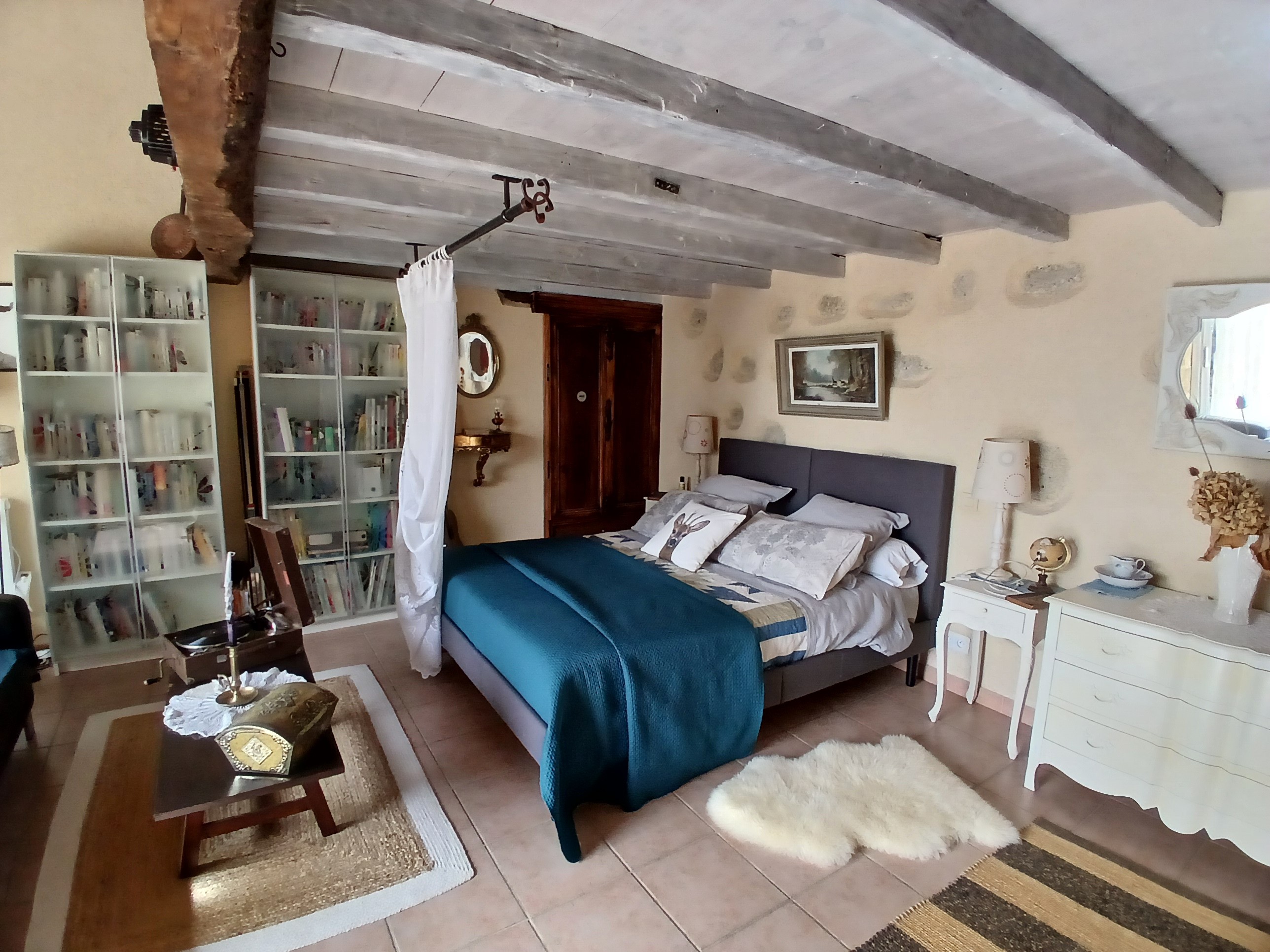 A large, cosy and bright bedroom 