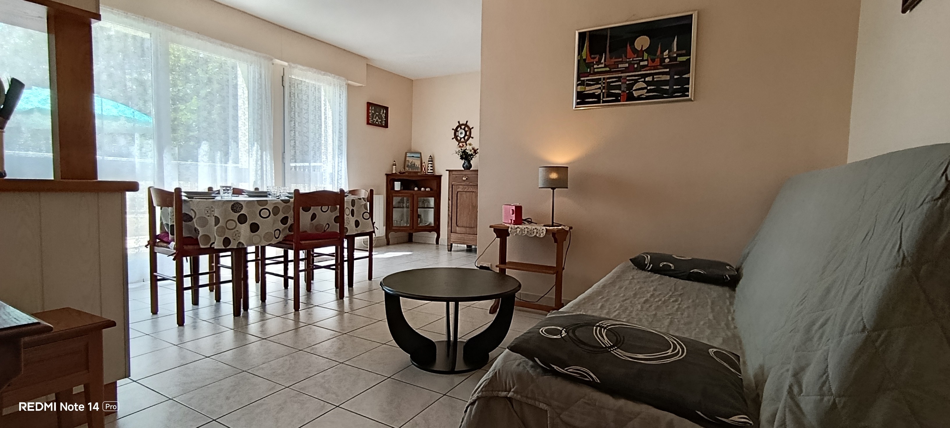 The dining and lounge areas in the living room – “Le Beaulieu” flat