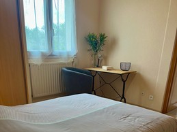 Chambre avec vue sur le jardin