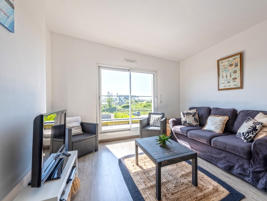 Etage: Mezzanine avec canapé convertible 2 places + TV, vue mer et accès au balcon terrasse