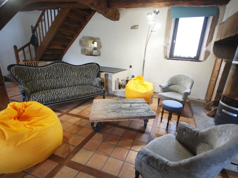 Salon cozy Gîte LE BEAUMONT DU LAC Longère 150m² Clévacances Beaumont du Lac 87120