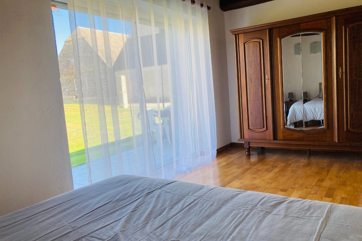 RDC - Chambre donnant sur le jardin