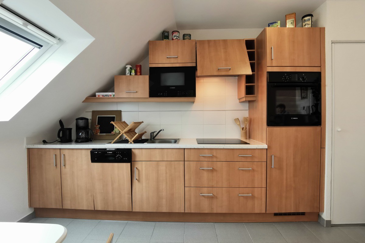 Espace cuisine aménagée et équipée