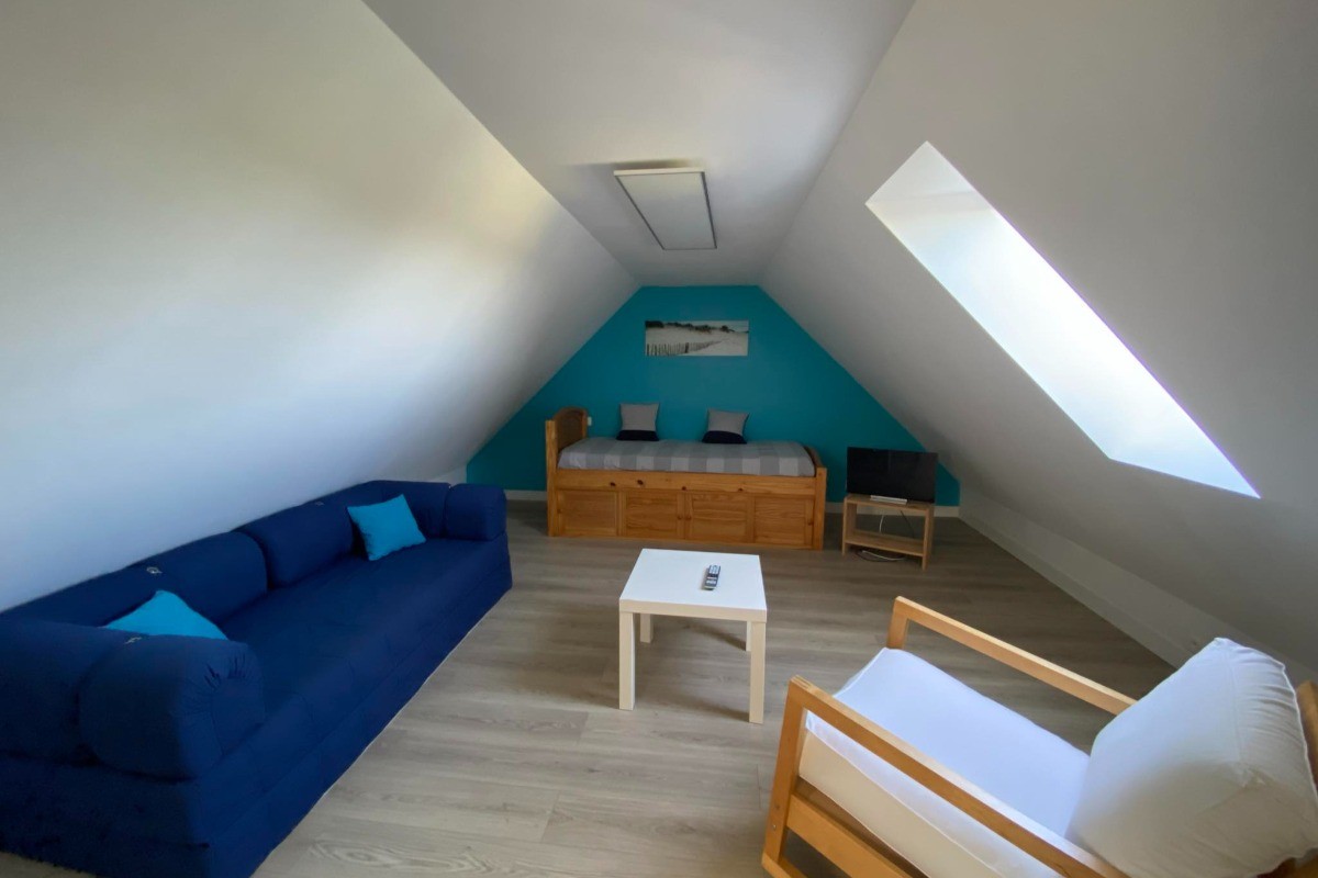 Mezzanine, salon télé, salle de jeu
