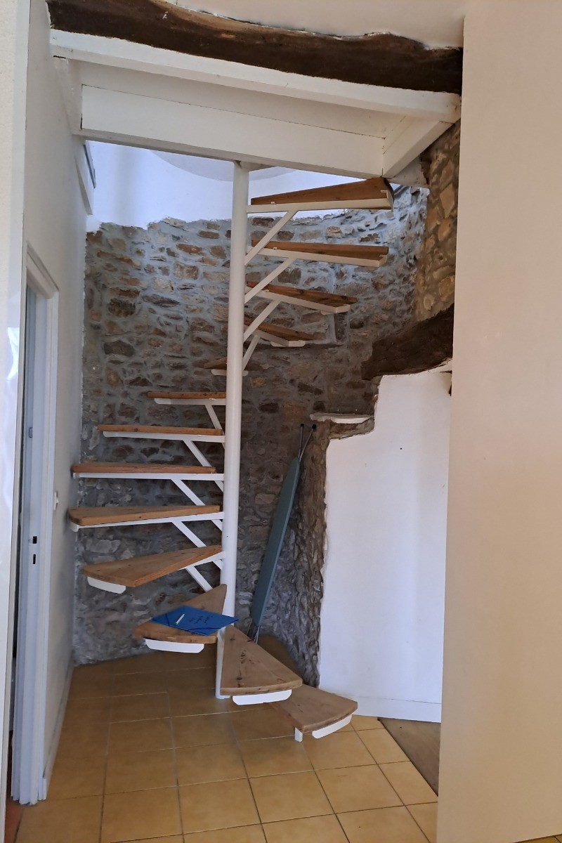 DELCROIX location Clévacances Runan l'escalier en colimaçon