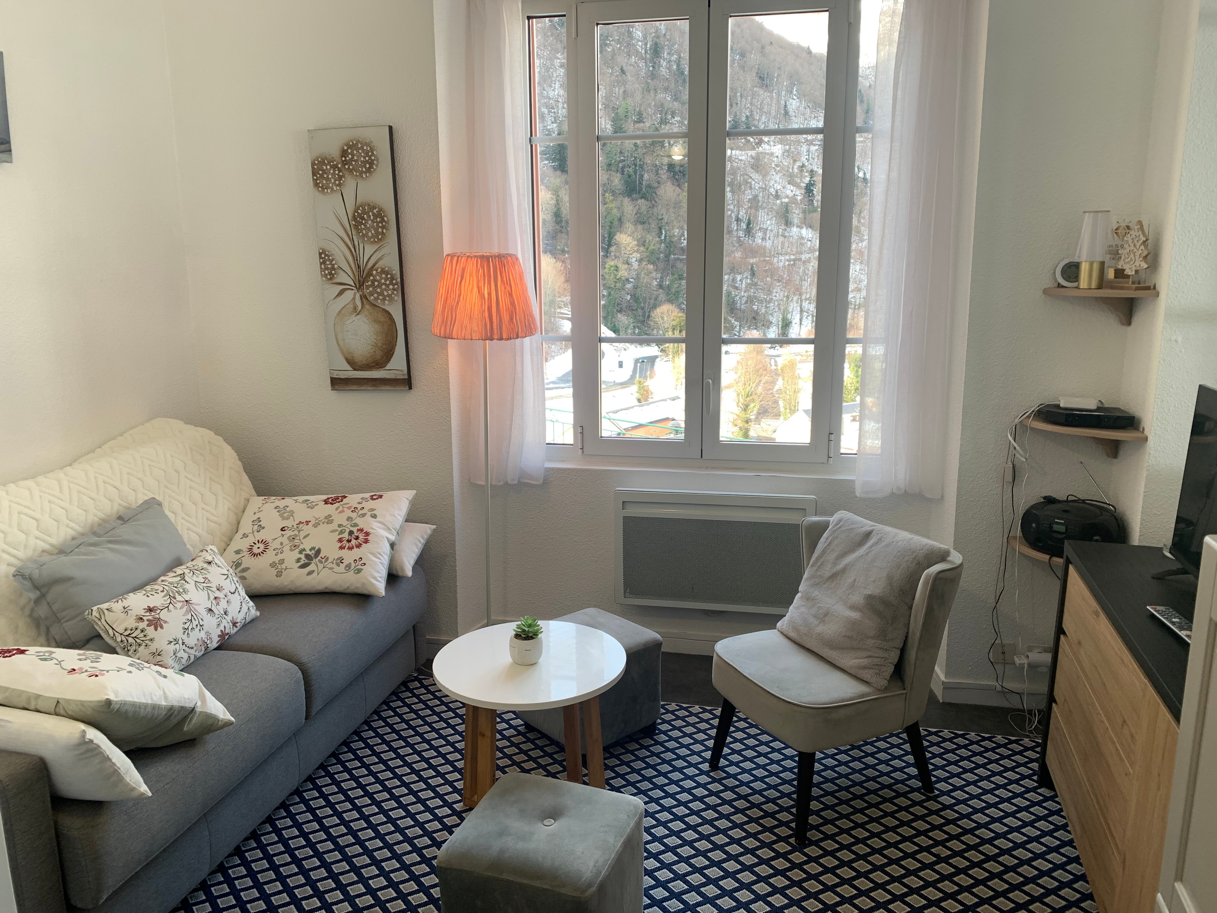 Coin salon avec canapé lit Rapido