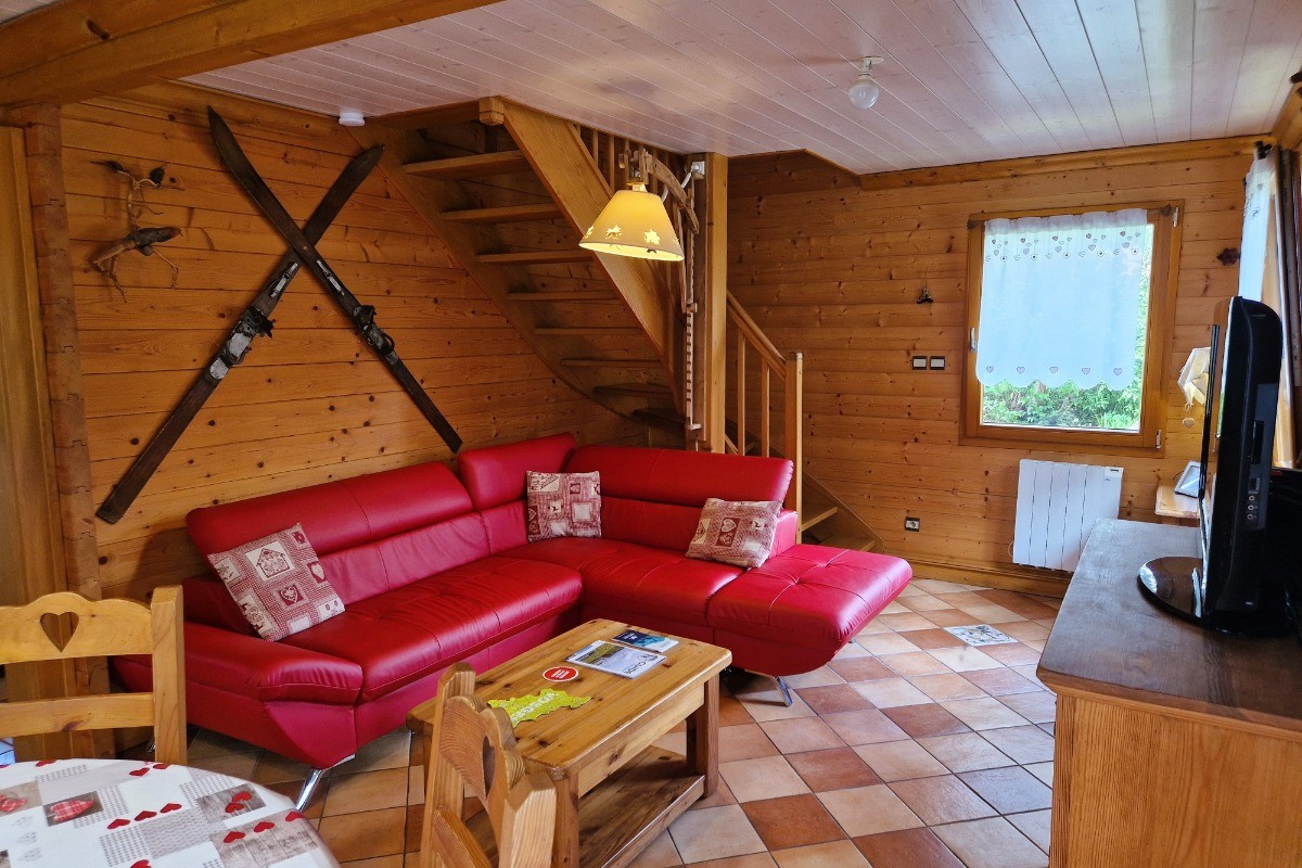 Pièce de vie avec canapé d'angle - Chalet Biazot, proche du Lac de Xonrupt-Longemer