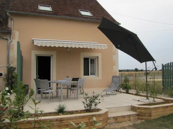 Détente côté jardin : la terrasse et le salon de jardin