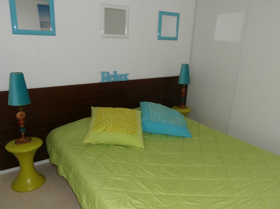 the cosy bedroom with its large wardrobes