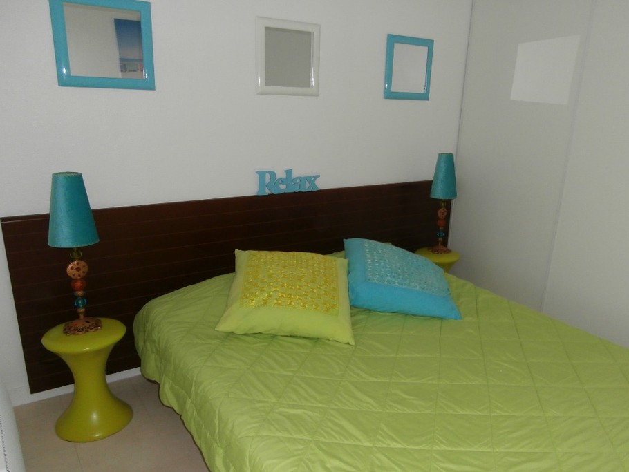 the cosy bedroom with its large wardrobes