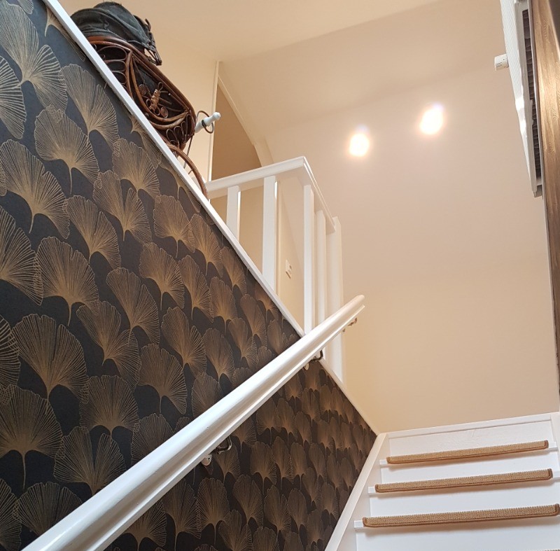 Staircase leading to the 2nd floor, where you will find 2 guest rooms and the breakfast room.