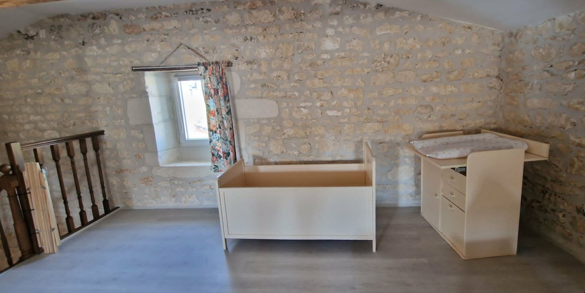 The attic is equipped for 1 or 2 people and a young child with a nappy changing table and cot.