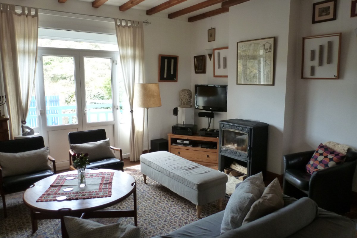 Salon avec TV pour vous octroyer une pause détente