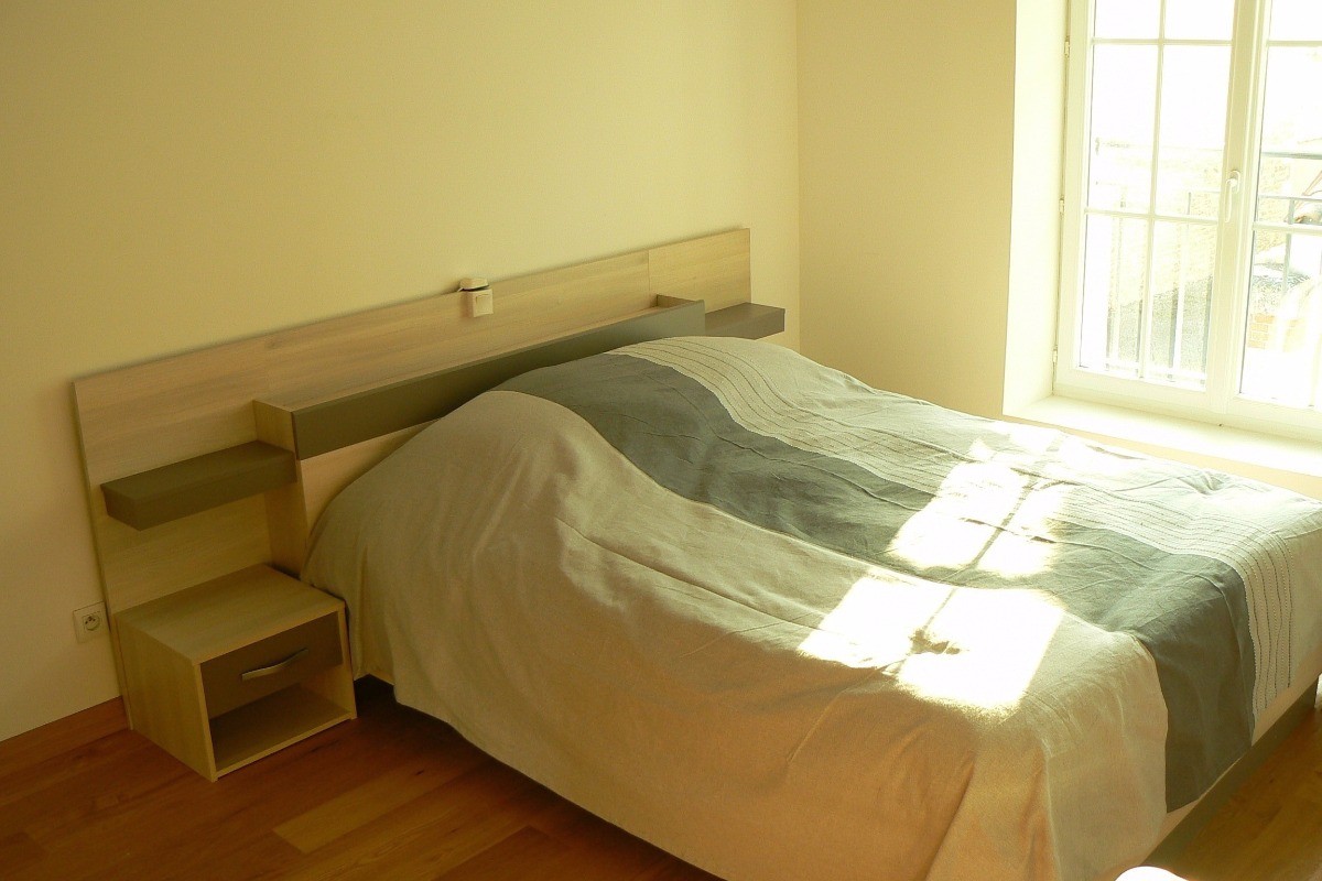 Chambre avec un lit en 140