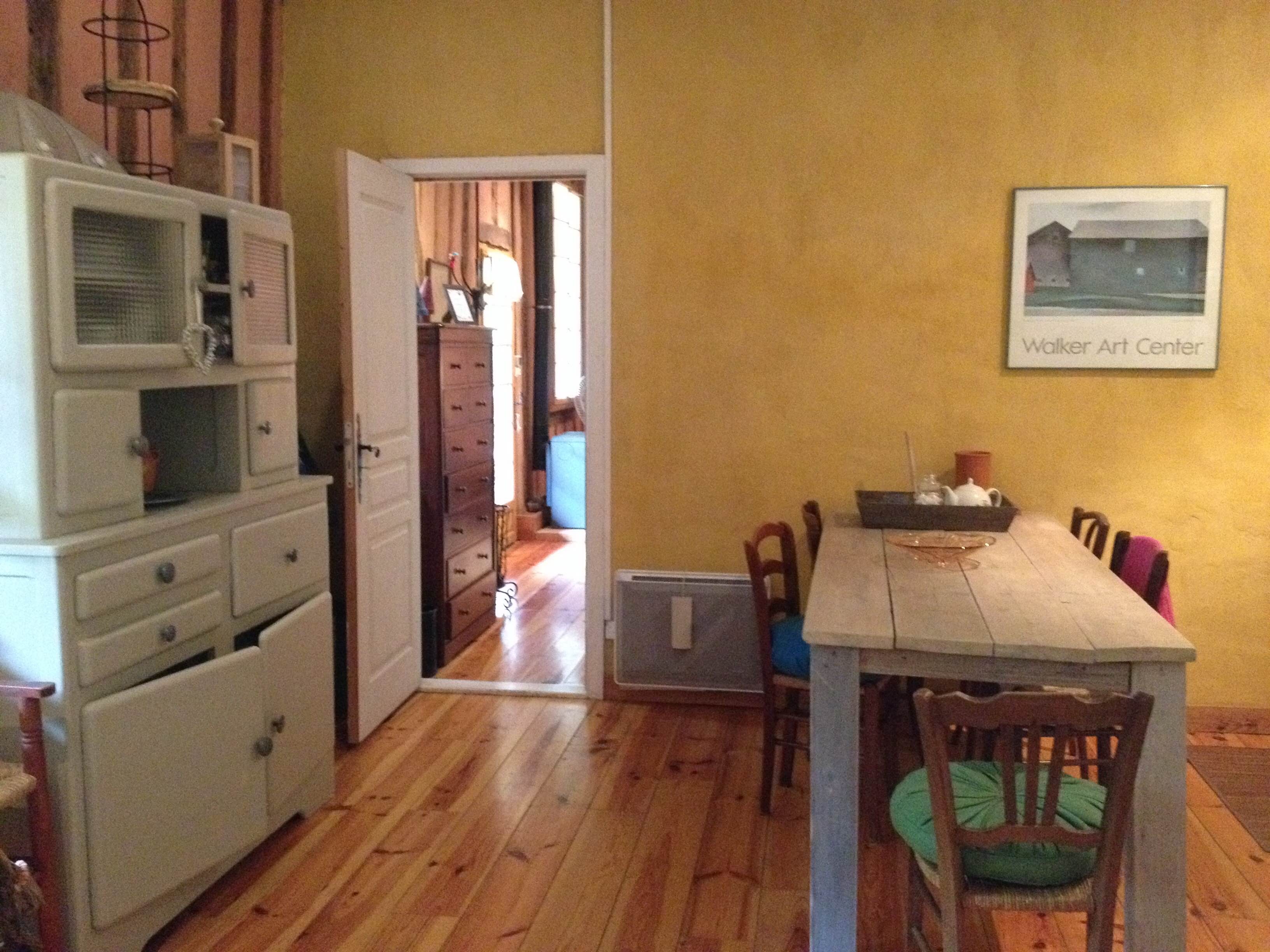 Well-equipped kitchen with table and chairs